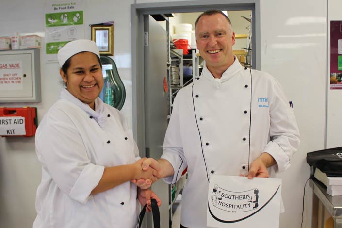 Filo receiving her prize