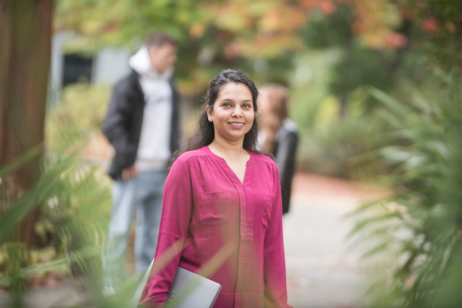 2024 April Business student walking on campus Sadia